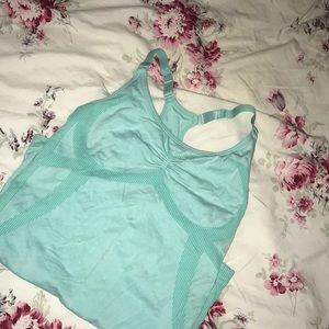 Teal racerback workout tank by Champion.